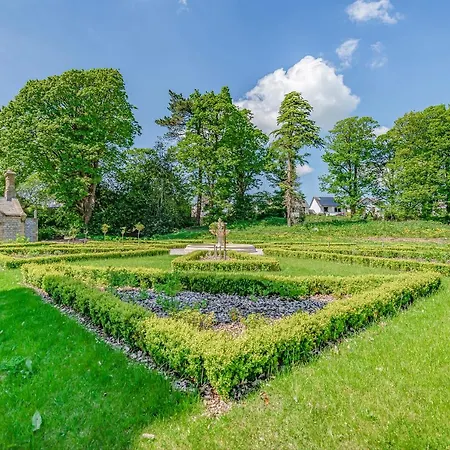 The Kennedy House Stone Cross Mansion